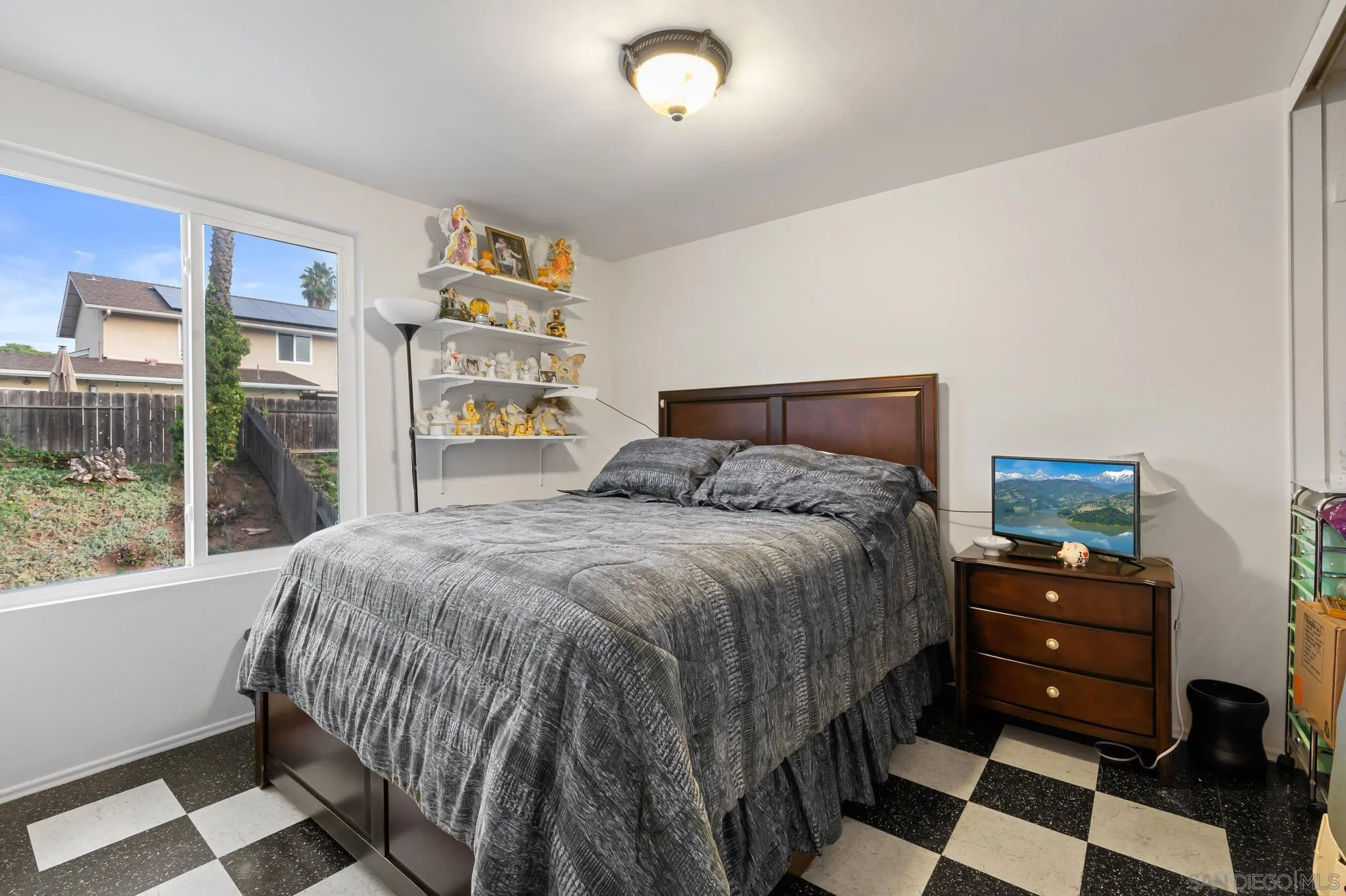 15041 Hesta Street Poway, CA 92064 - Photo 24 of 25 a bedroom with a bed and a window