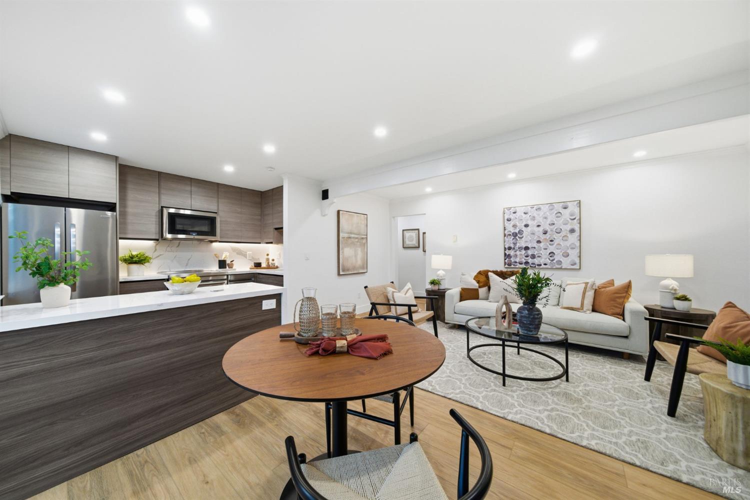 116 Stanford Way Sausalito, CA 94965 - Photo 1 of 37 a living room with furniture and a dining table with rug