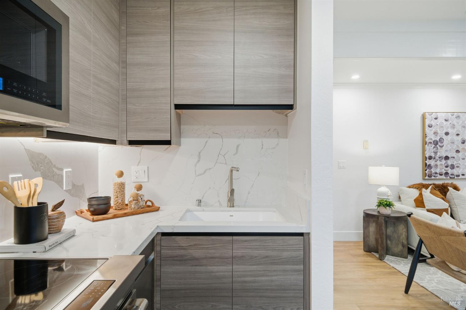 116 Stanford Way Sausalito, CA 94965 - Photo 14 of 37 a kitchen with a sink cabinets and counter space