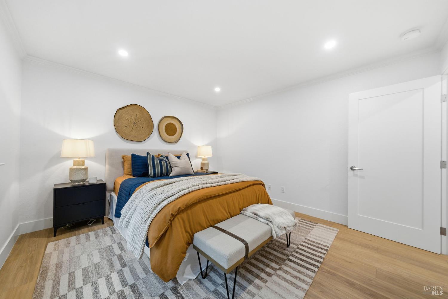 116 Stanford Way Sausalito, CA 94965 - Photo 16 of 37 a bed room with a bed and painting on the wall