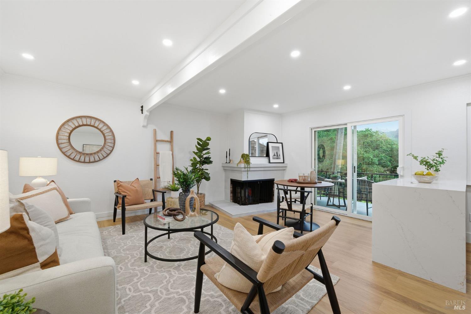 116 Stanford Way Sausalito, CA 94965 - Photo 2 of 37 a living room with fireplace furniture and a wooden floor