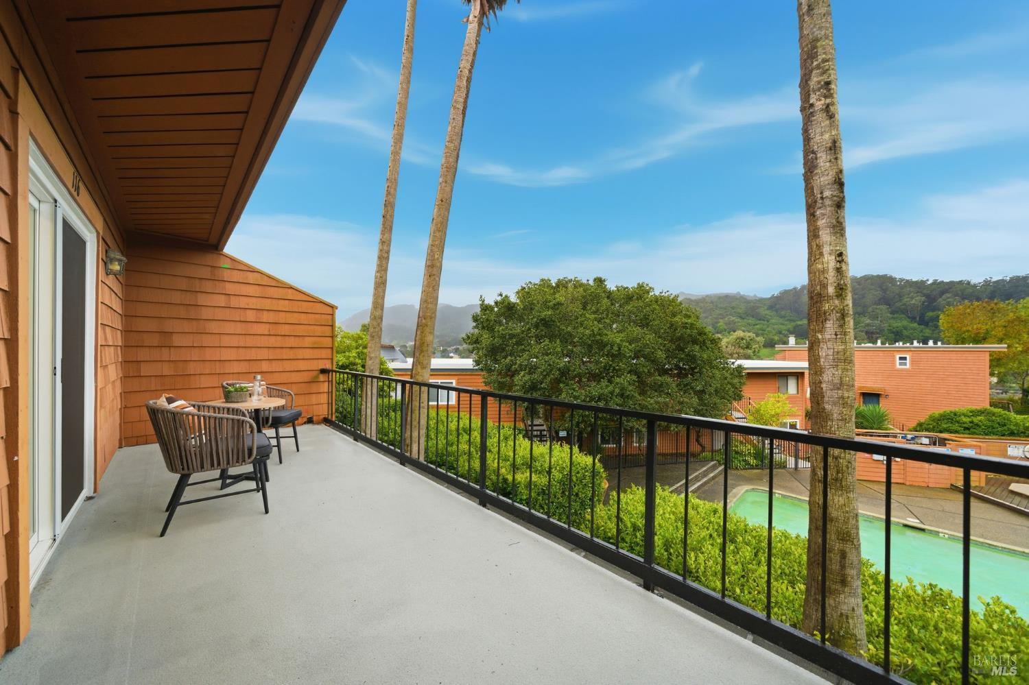 116 Stanford Way Sausalito, CA 94965 - Photo 24 of 37 a view of a chair and tables in the balcony