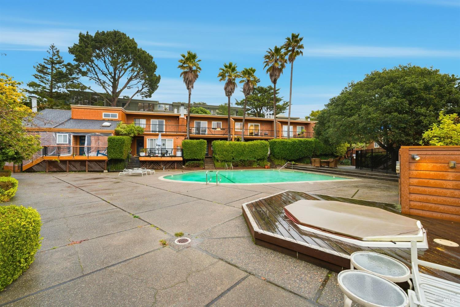 116 Stanford Way Sausalito, CA 94965 - Photo 27 of 37 a swimming pool with outdoor seating and yard
