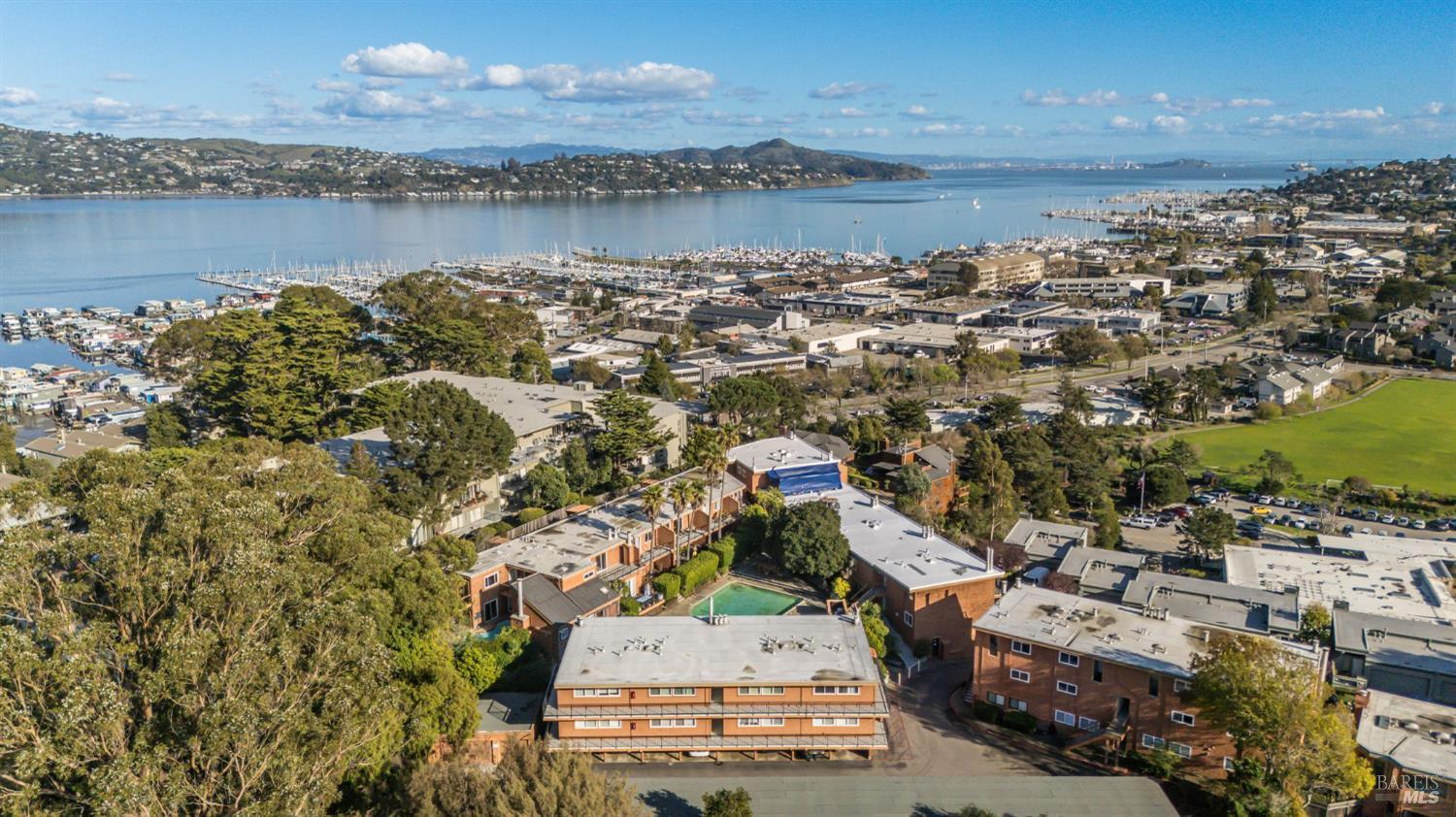 116 Stanford Way Sausalito, CA 94965 - Photo 31 of 37 an aerial view of a building with outdoor space lake and trees all around