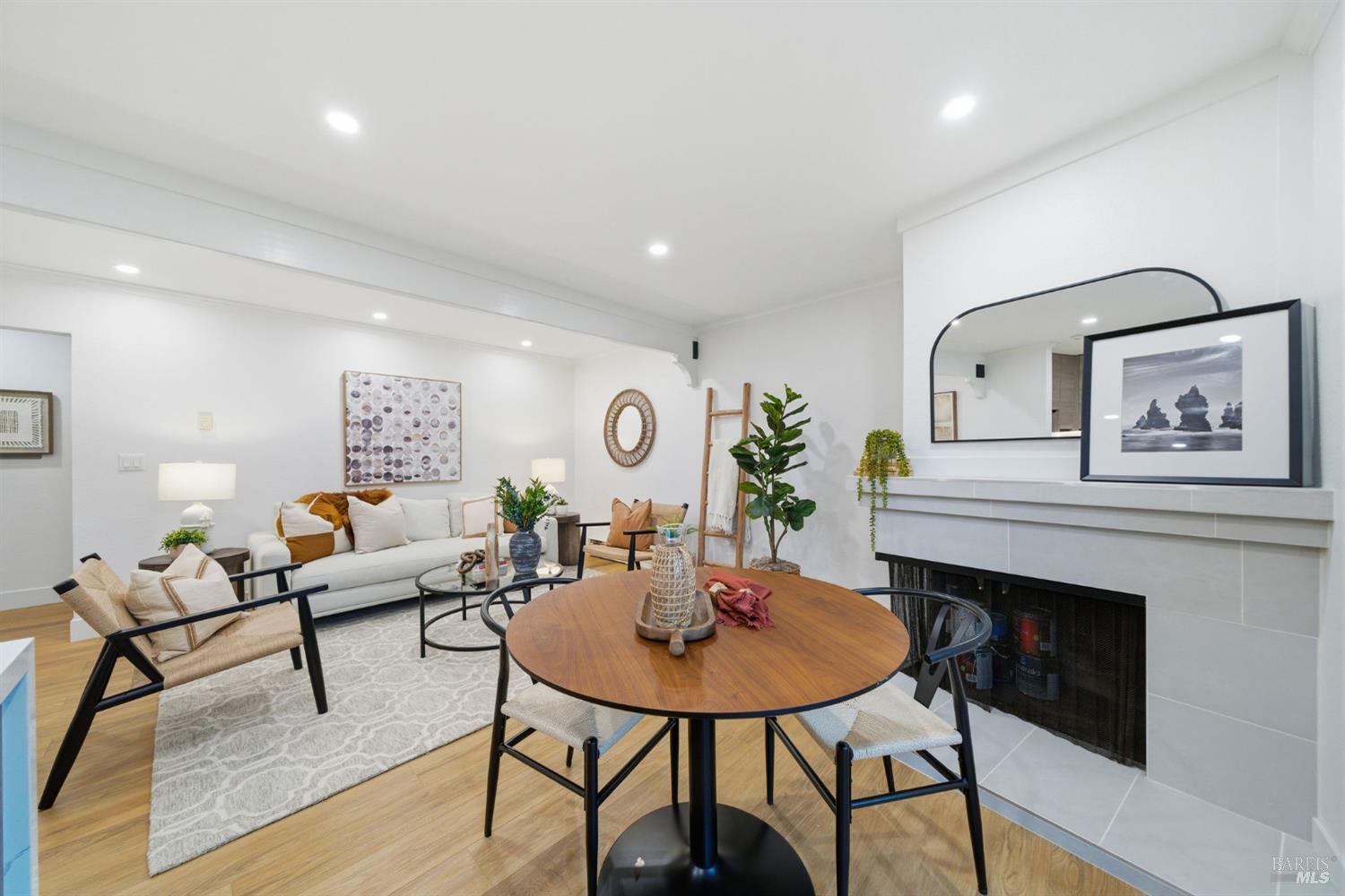 116 Stanford Way Sausalito, CA 94965 - Photo 5 of 37 a living room with furniture and a fireplace
