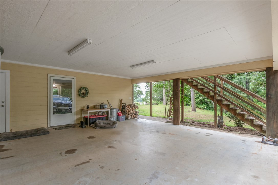 9997 Calhoun Road Bryan, TX 77808 - Photo 35 of 50 a view of a room with large windows and couch
