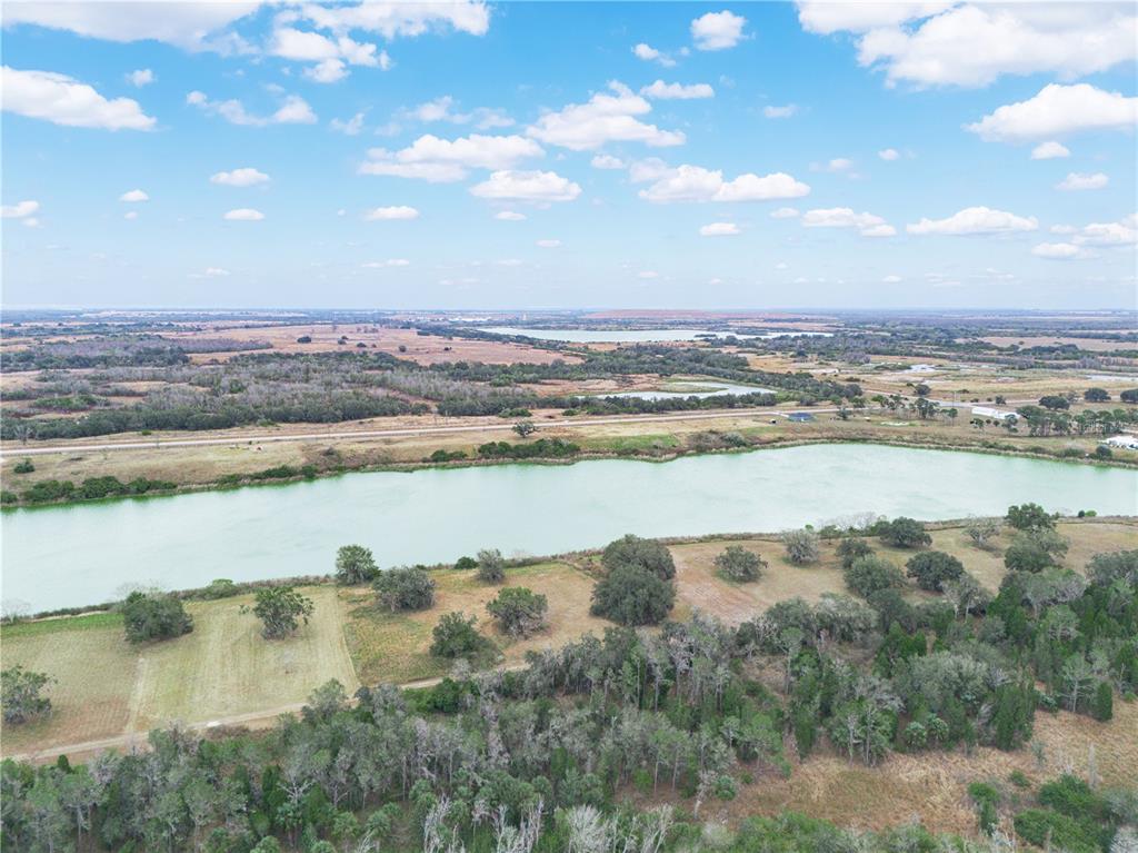 10349 County Road 555 Fort Meade, FL 33841 - Photo 4 of 17 a view of a lake with a city