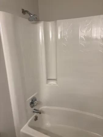 a bathroom with a bathtub