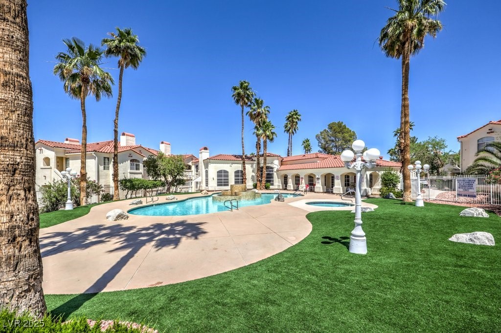 698 South Racetrack Road, Unit 1014 Henderson, NV 89015 - Photo 17 of 25 Community pool featuring a patio area and a community hot tub