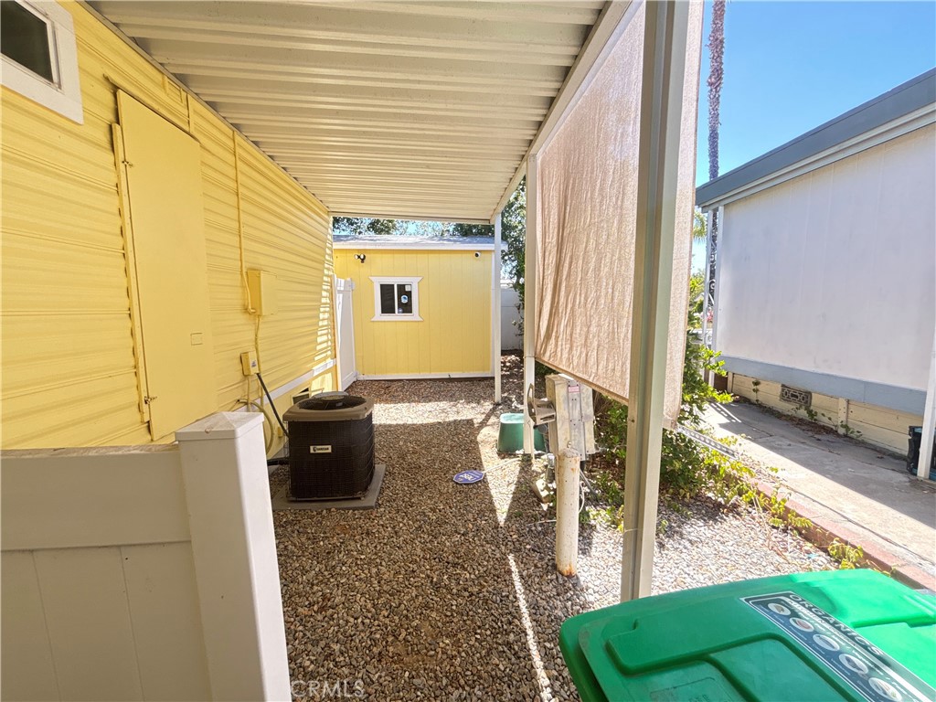 31130 South General Kearny Road, Unit 172 Temecula, CA 92591 - Photo 6 of 49 Back Side of carport