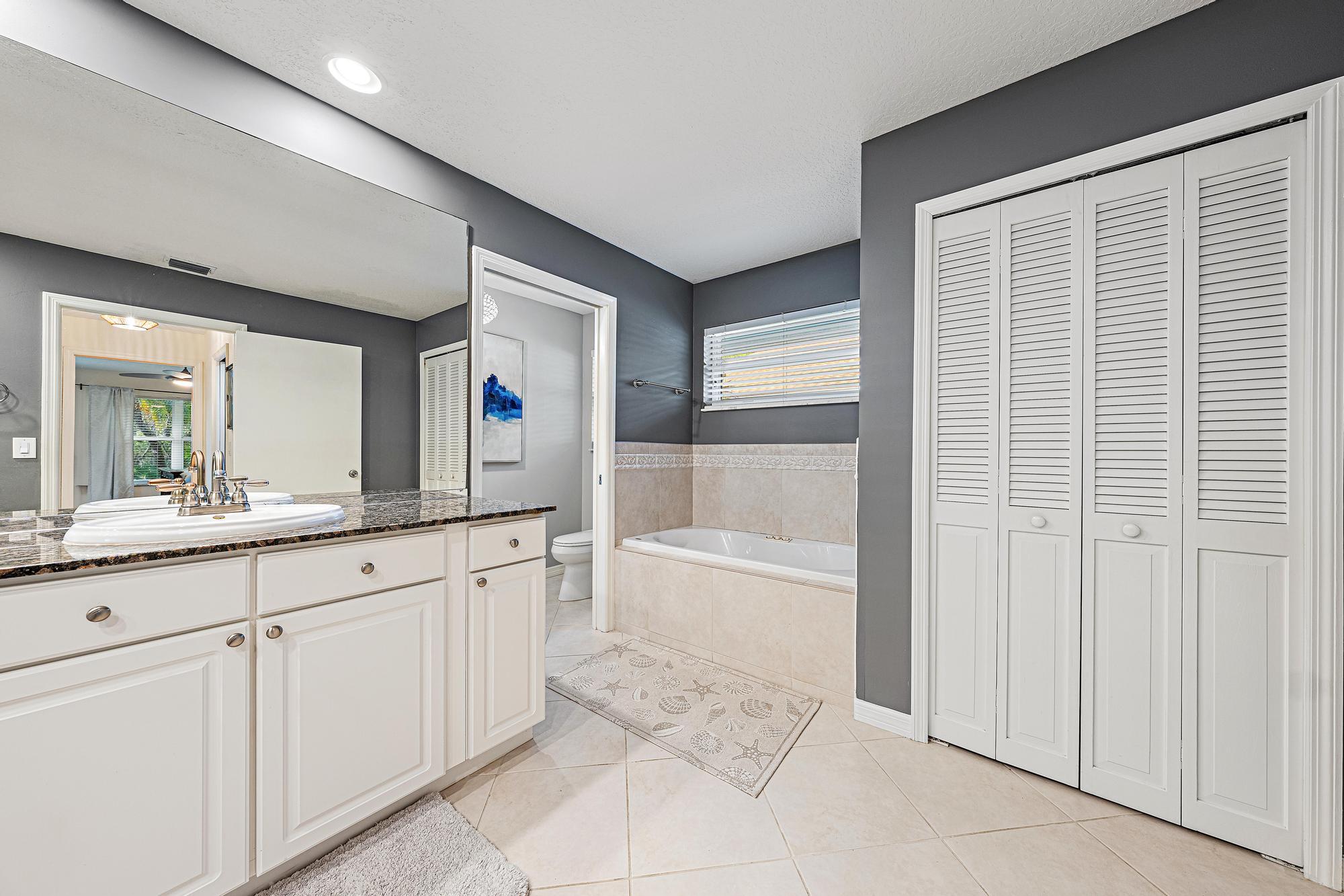 6462 Winding Lake Drive Jupiter, FL 33458 - Photo 21 of 42 Primary Suite Bathroom