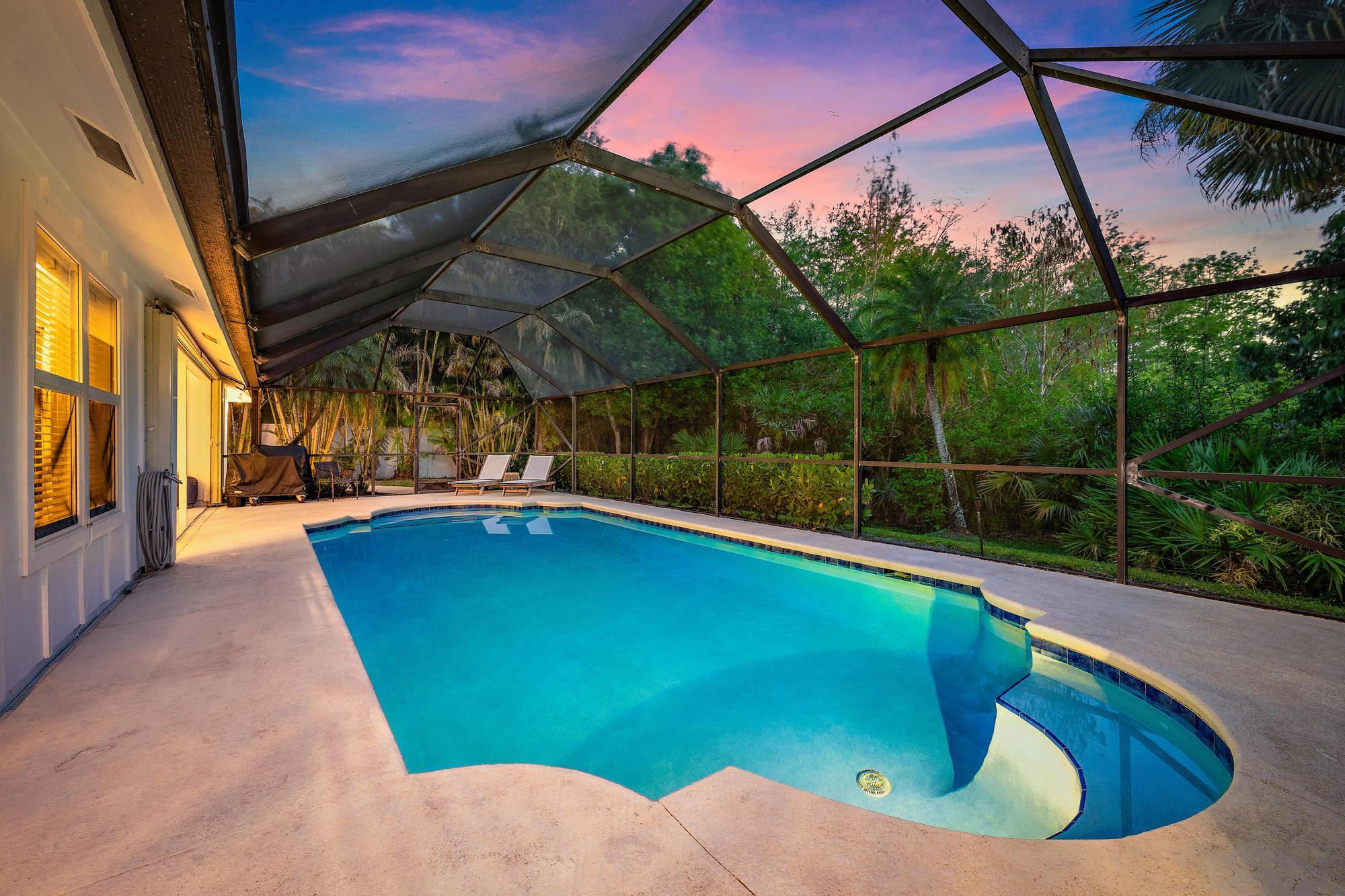 6462 Winding Lake Drive Jupiter, FL 33458 - Photo 32 of 42 Twilight Pool View