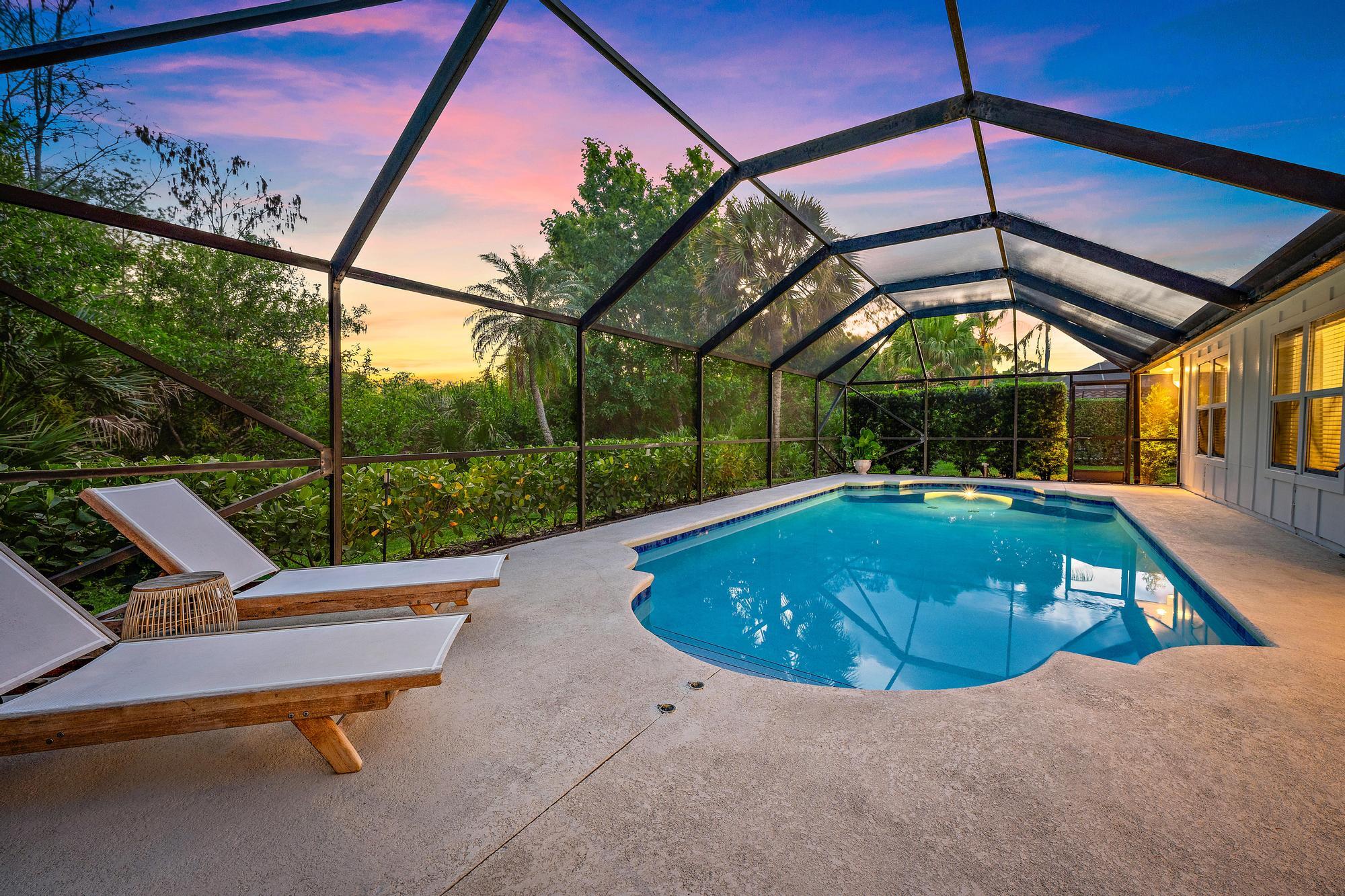6462 Winding Lake Drive Jupiter, FL 33458 - Photo 5 of 42 Twilight Pool View with lanai