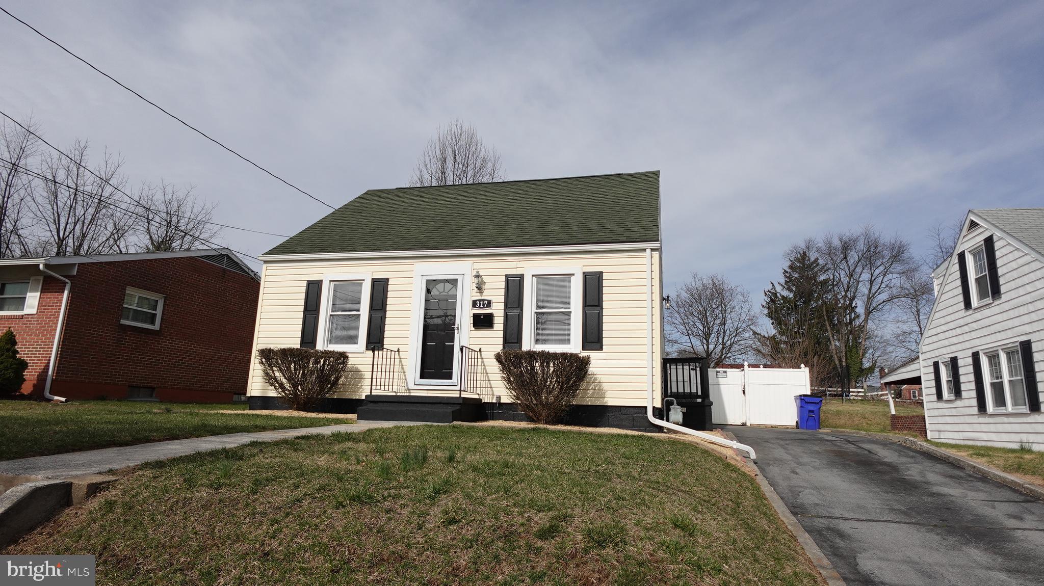 317 Devonshire Road Hagerstown, MD 21740 - Photo 80 of 114 a front view of a house with a yard