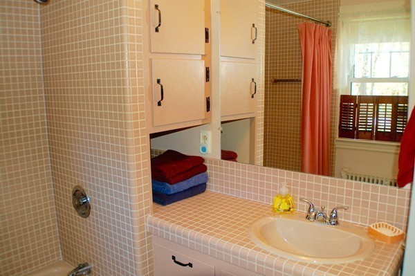 18 Tilden Road Scituate, MA 02066 - Photo 17 of 30 a bathroom with a sink a toilet and shower