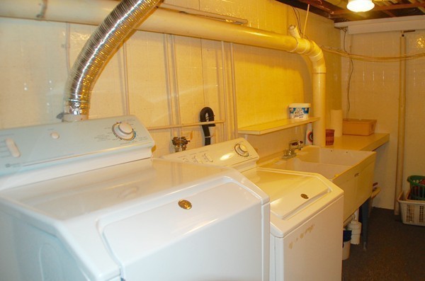 18 Tilden Road Scituate, MA 02066 - Photo 23 of 30 a bathroom with a tub sink and mirror