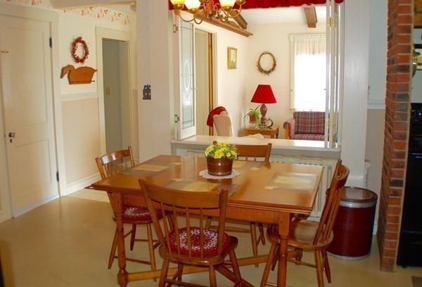 18 Tilden Road Scituate, MA 02066 - Photo 7 of 30 a view of a dining room with furniture and chandelier