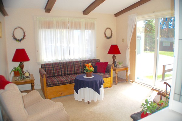 18 Tilden Road Scituate, MA 02066 - Photo 8 of 30 a living room filled with furniture and a window