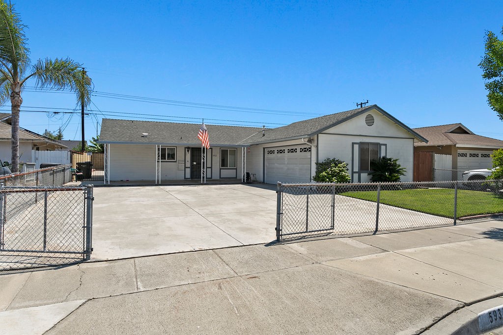 5932 Chinook Drive Huntington Beach, CA 92647 - Photo 2 of 5 a view of house with a yard and potted plants