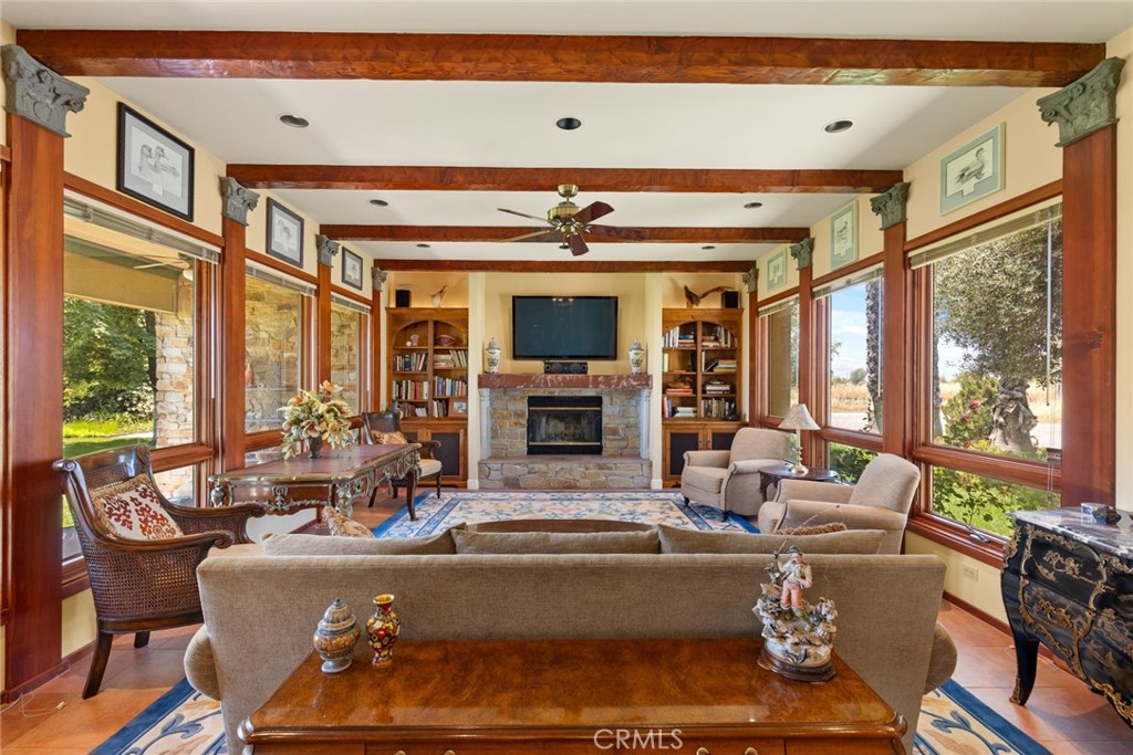 6177 Norman Road, Unit 3 Colusa, CA 95932 - Photo 17 of 48 a living room with fireplace furniture and a large window
