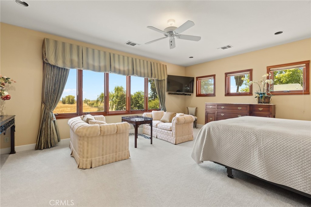 6177 Norman Road, Unit 3 Colusa, CA 95932 - Photo 30 of 48 a bedroom with a bed and a large window