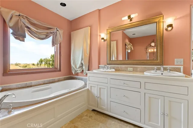 a bathroom with a shower sink and mirror