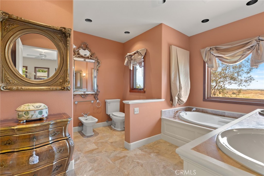 6177 Norman Road, Unit 3 Colusa, CA 95932 - Photo 35 of 48 a bathroom with a tub sink and mirror