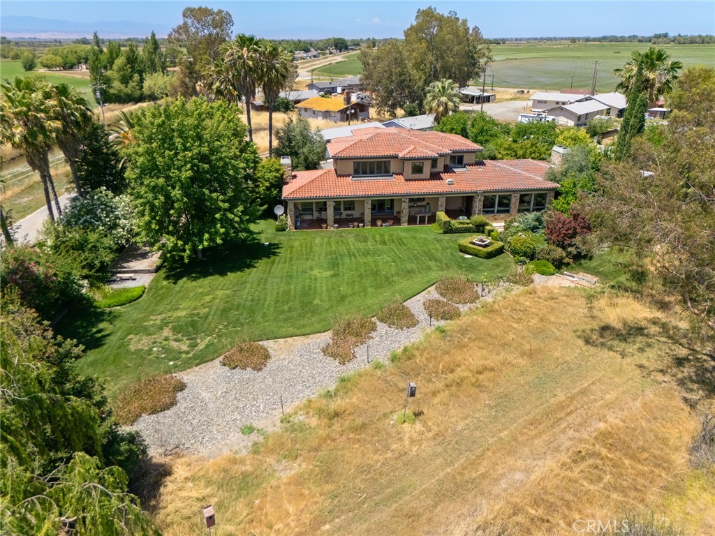 6177 Norman Road, Unit 3 Colusa, CA 95932 - Photo 46 of 48 a view of a house with a yard and sitting area