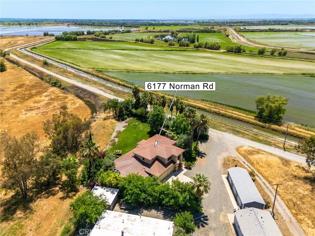 a view of a lake with a yard