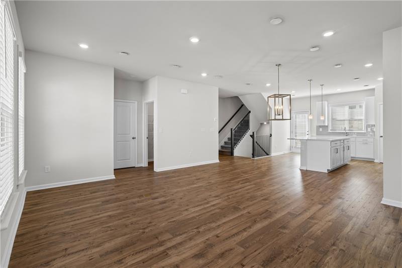 123 Matson Run Southwest Mableton, GA 30126 - Photo 17 of 32 a view of a kitchen with wooden floor and a sink
