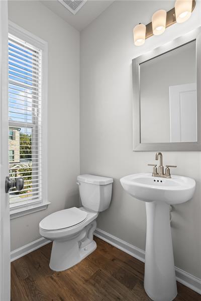 123 Matson Run Southwest Mableton, GA 30126 - Photo 19 of 32 a bathroom with a sink toilet and a mirror