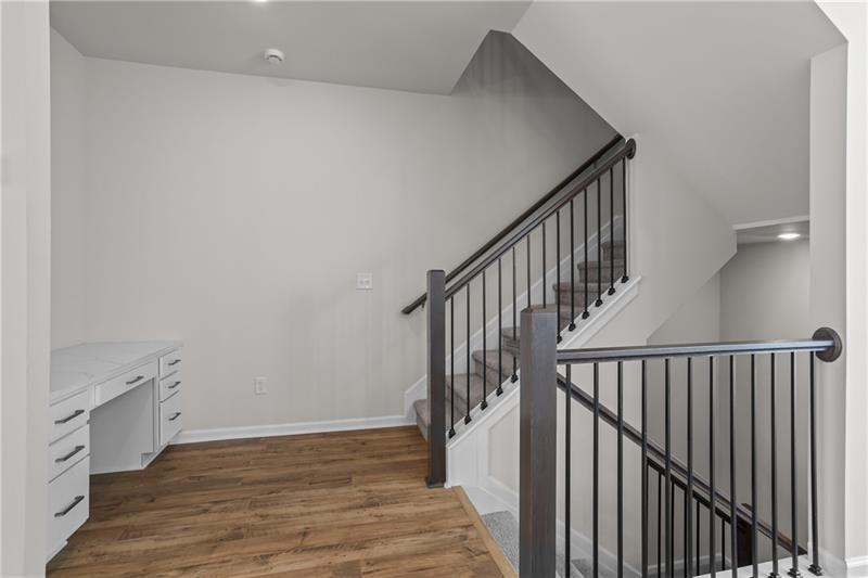 123 Matson Run Southwest Mableton, GA 30126 - Photo 20 of 32 a view of a hallway with wooden floor and entryway