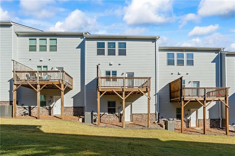 123 Matson Run Southwest Mableton, GA 30126 - Photo 30 of 32 a view of multiple houses with a yard