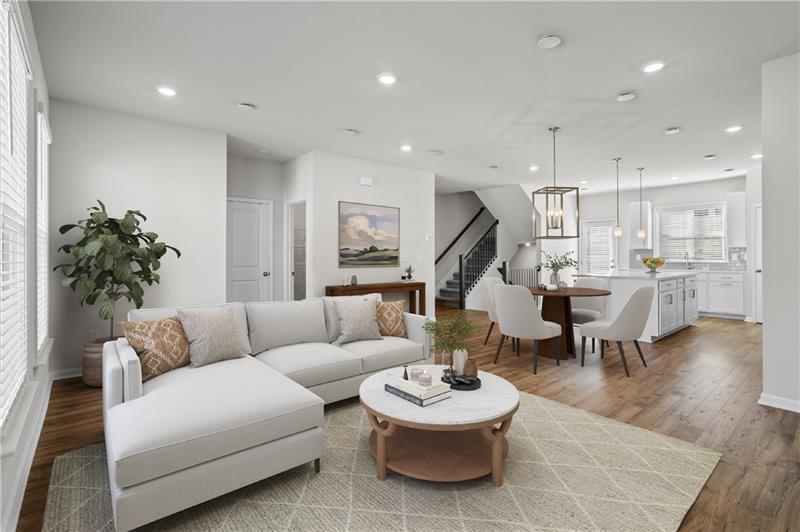 123 Matson Run Southwest Mableton, GA 30126 - Photo 6 of 32 a living room with furniture and wooden floor