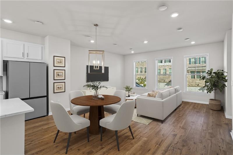 123 Matson Run Southwest Mableton, GA 30126 - Photo 7 of 32 a living room with furniture and a wooden floor