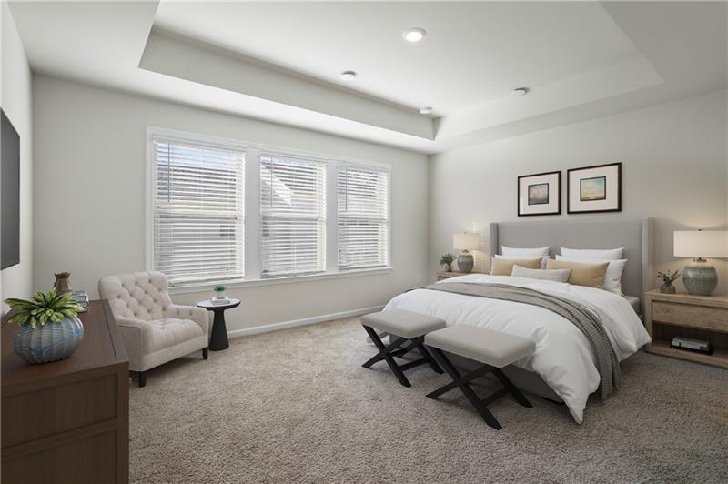 123 Matson Run Southwest Mableton, GA 30126 - Photo 8 of 32 a spacious bedroom with a bed and a couch