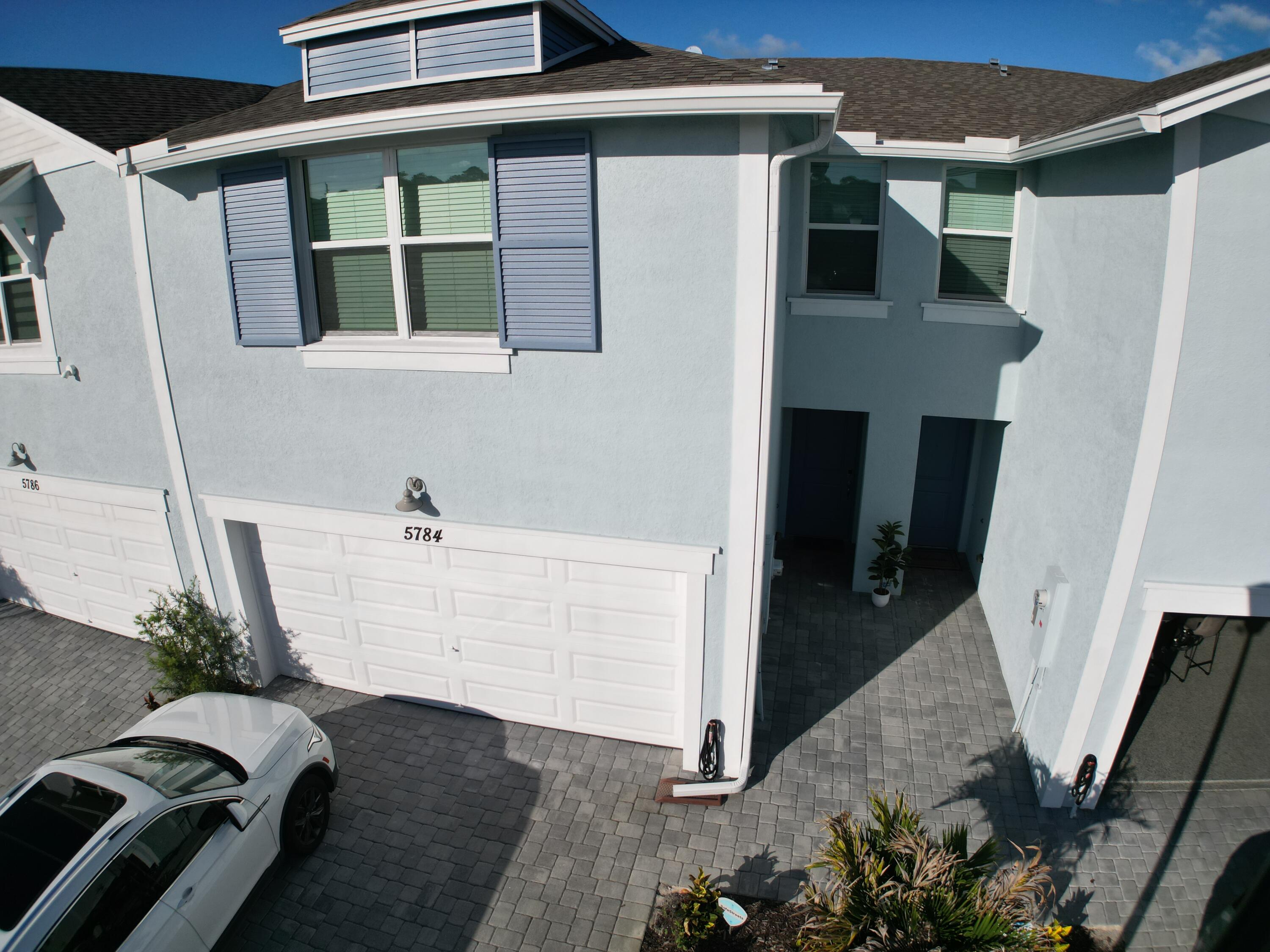 5784 Southeast Edgewater Circle Stuart, FL 34997 - Photo 28 of 33 a view of entryway with a front door
