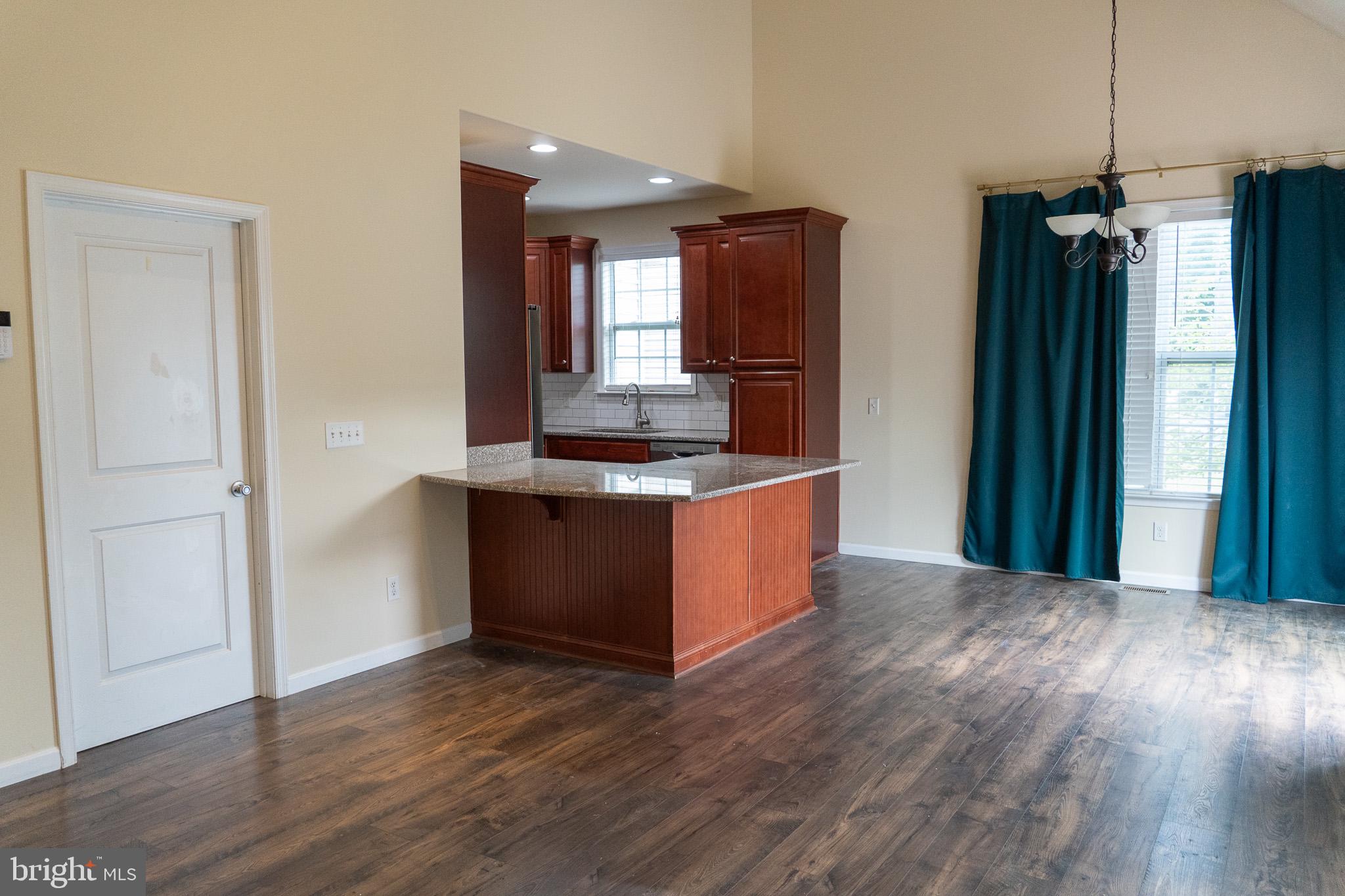 27 Sun Ridge Drive Felton, DE 19943 - Photo 7 of 41 Spacious open-concept living area.