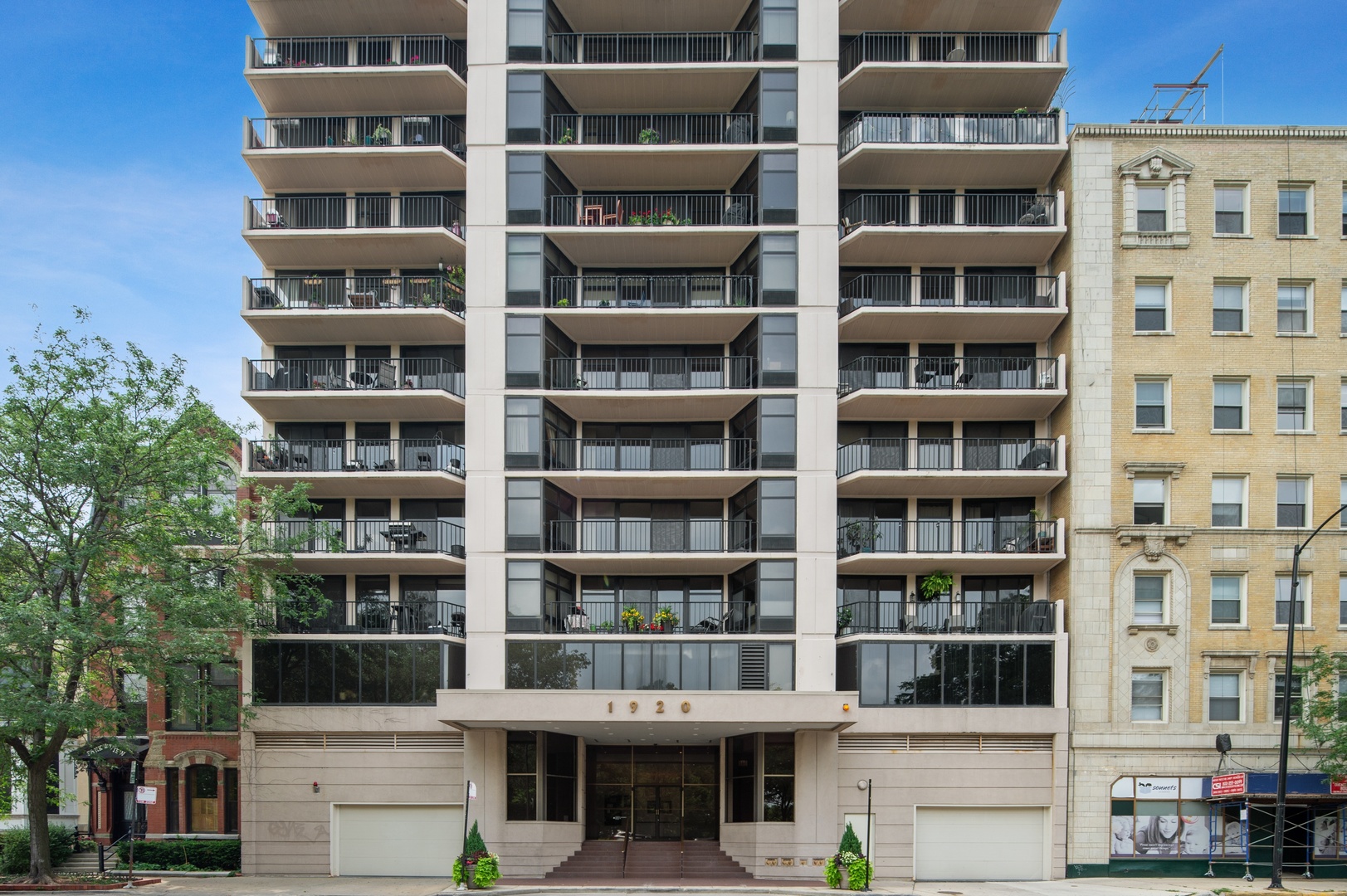 1920 North Clark Street, Unit 4B Chicago, IL 60614 - Photo 1 of 21 a front view of a building with a lot of windows