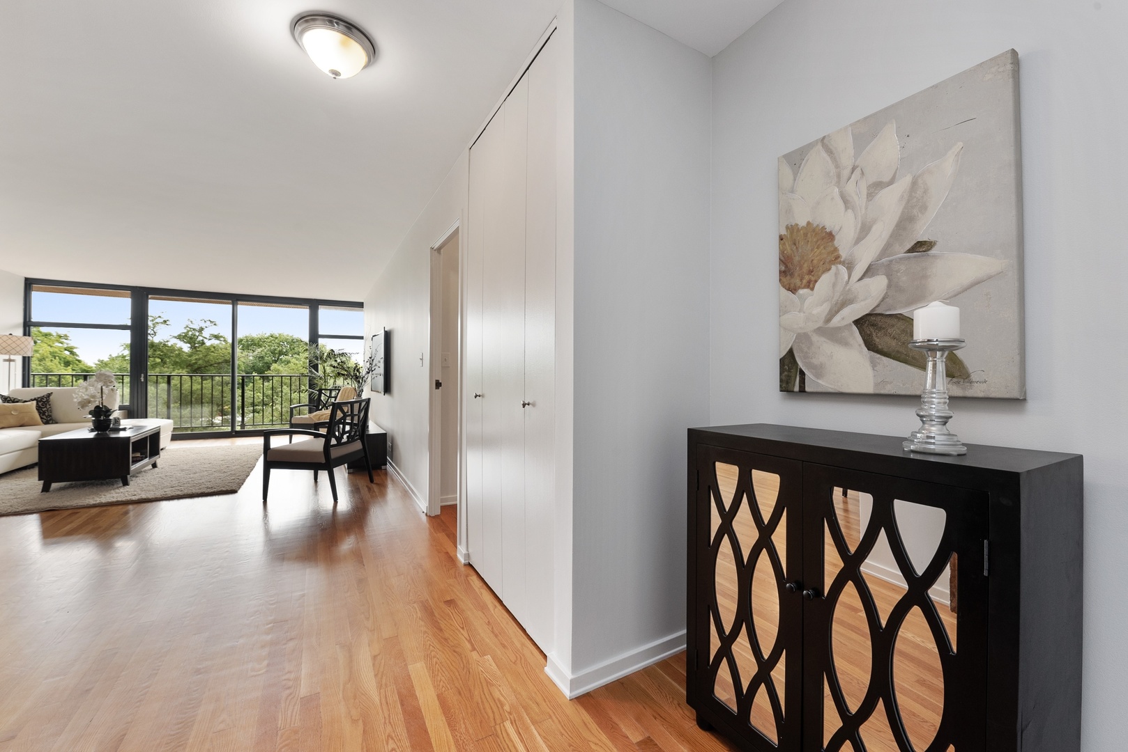 1920 North Clark Street, Unit 4B Chicago, IL 60614 - Photo 2 of 21 a view of a dining room with furniture window and wooden floor