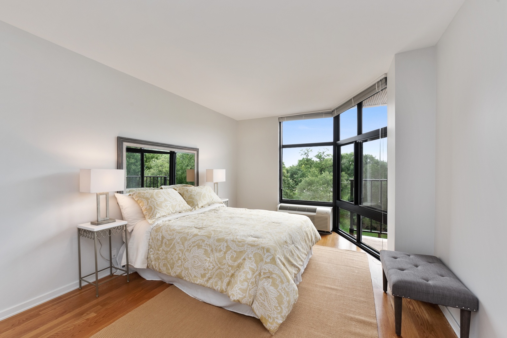 1920 North Clark Street, Unit 4B Chicago, IL 60614 - Photo 11 of 21 a bedroom with a bed and a large window