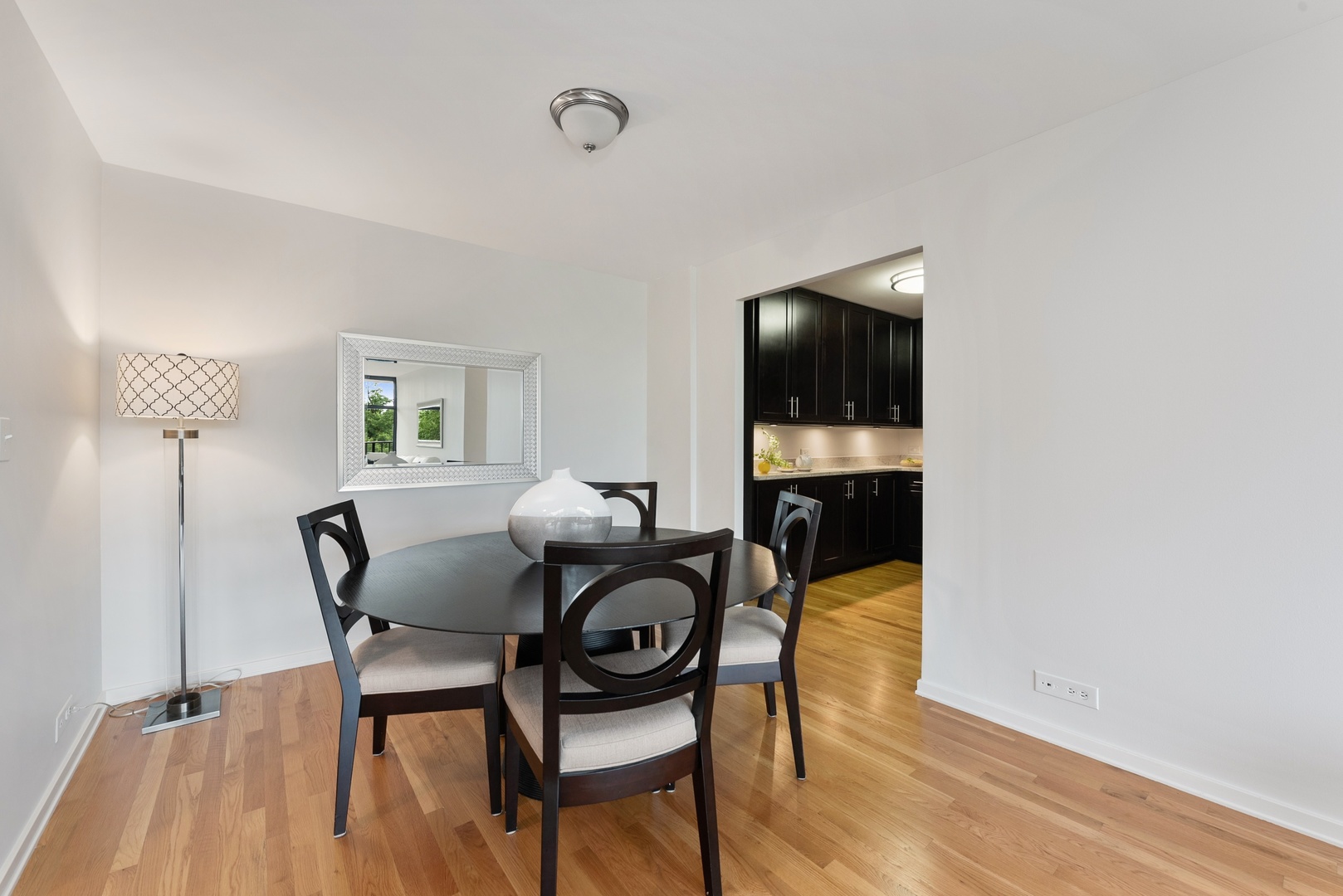 1920 North Clark Street, Unit 4B Chicago, IL 60614 - Photo 7 of 21 a dining room with furniture and window