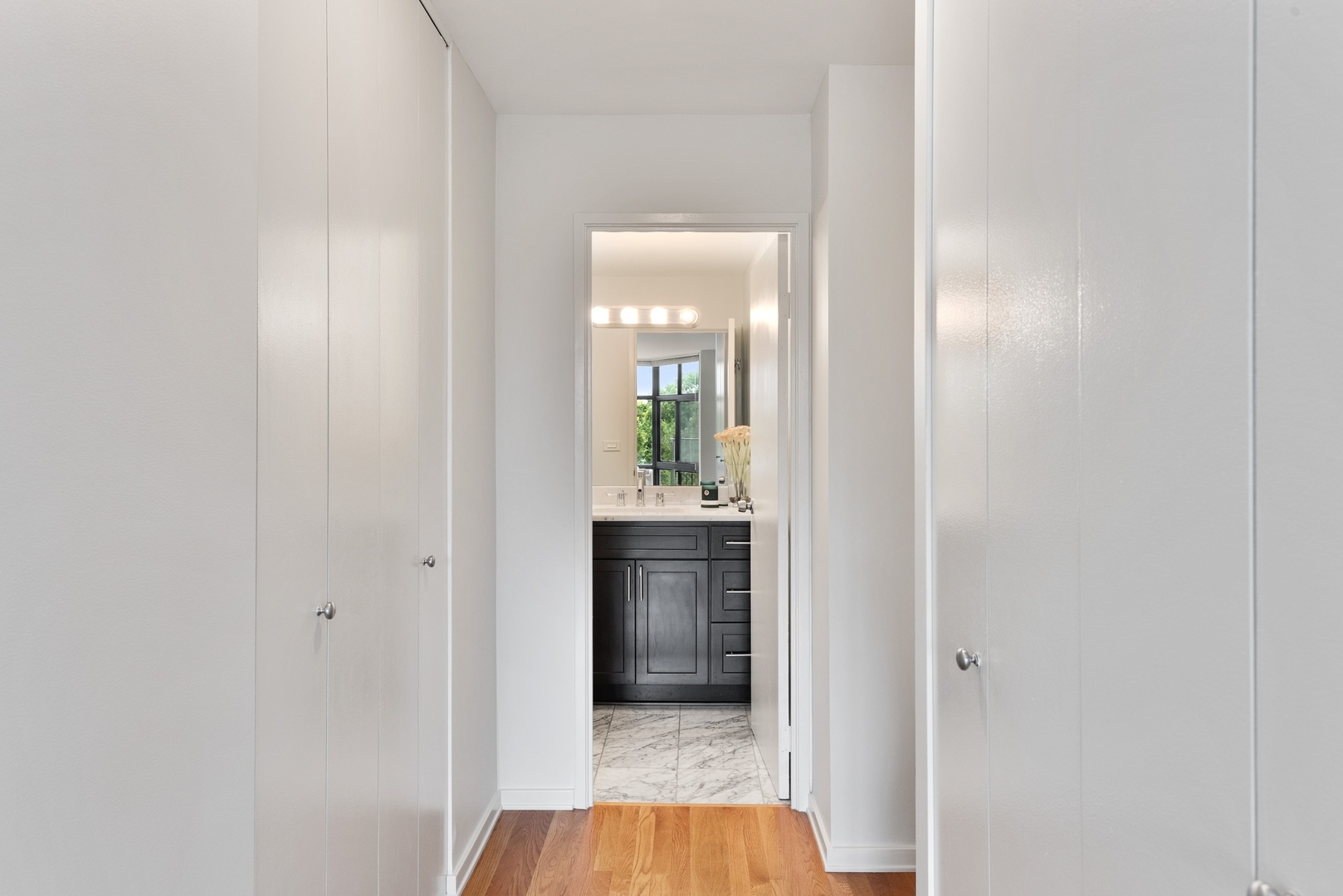 1920 North Clark Street, Unit 4B Chicago, IL 60614 - Photo 10 of 21 a view of an entryway and a kitchen