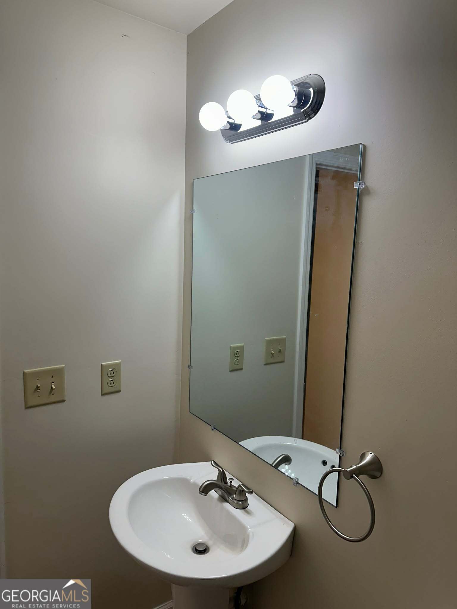 1167 Turner Way, Unit A Macon, GA 31217 - Photo 5 of 10 a bathroom with a mirror and a sink
