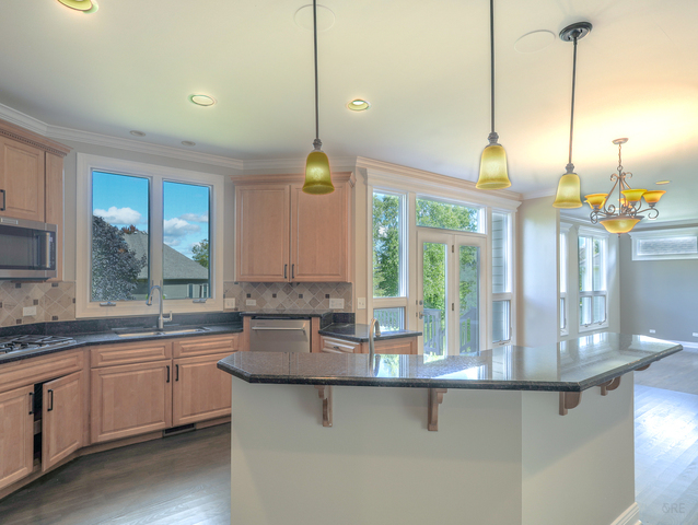 618 Pine Street Sugar Grove, IL 60554 - Photo 12 of 31 a kitchen with sink and window