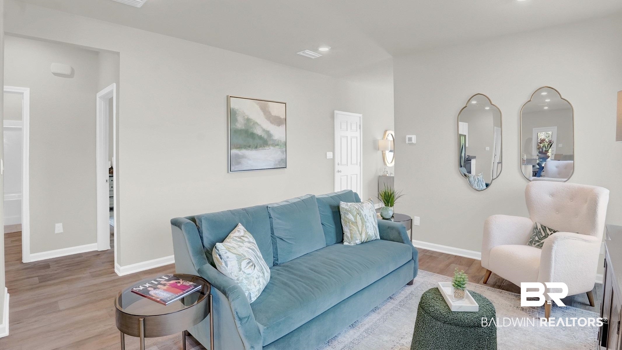 13330 Shea Circle Foley, AL 36535 - Photo 4 of 15 Living area featuring wood-finish flooring, light neutral wall tones, white baseboards, and recessed lighting