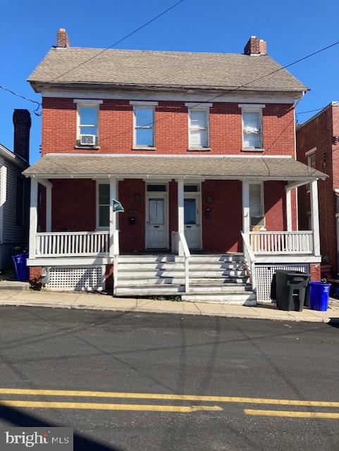 a view of a house with a balcony