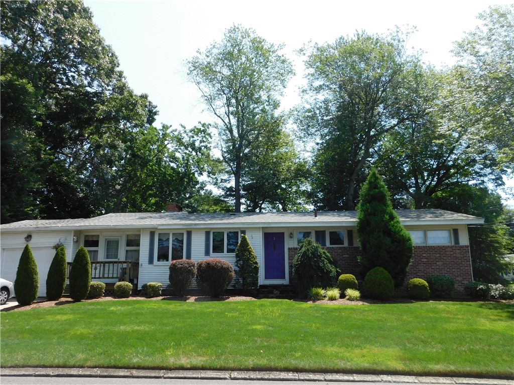 Welcome home! Vinyl siding, with brick front.