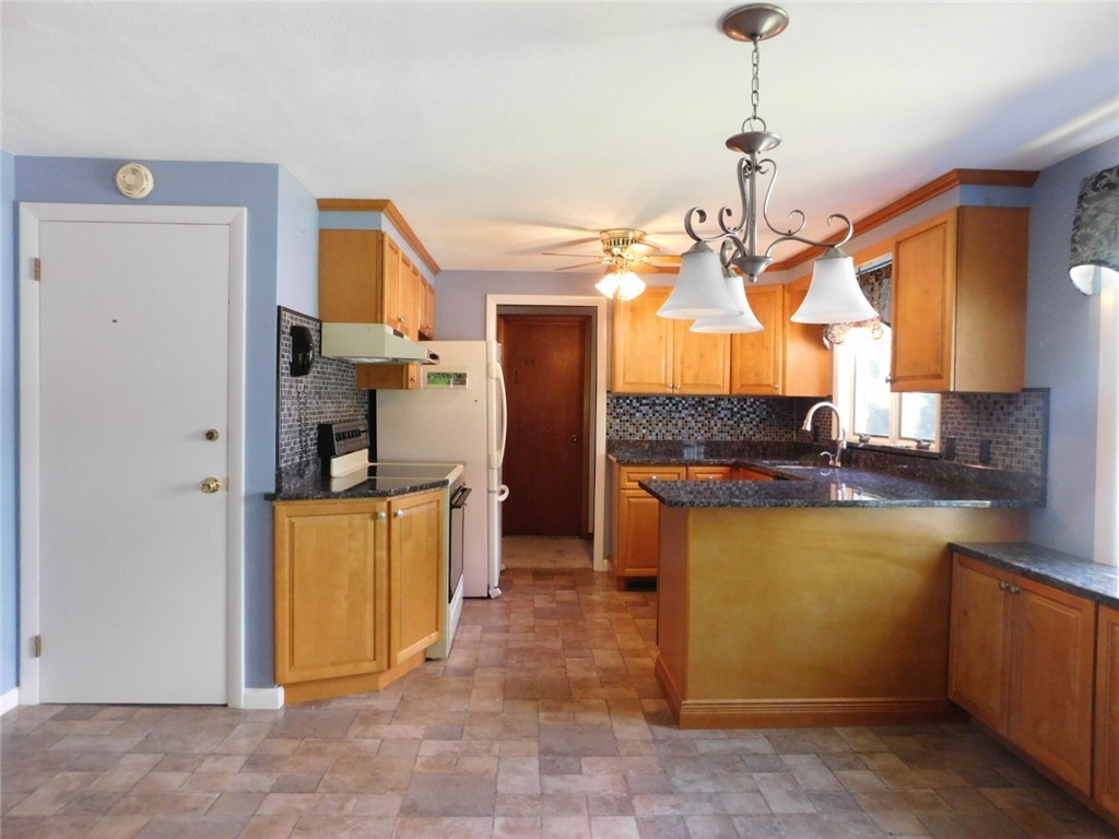 2 Deborah Road Warwick, RI 02888 - Photo 17 of 44 Eat-in-kitchen has a separate dining area.
