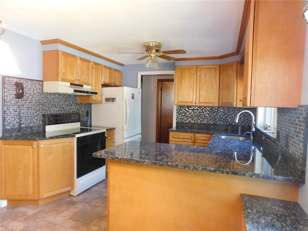 2 Deborah Road Warwick, RI 02888 - Photo 19 of 44 Tile backsplash completed the kitchen renovation.